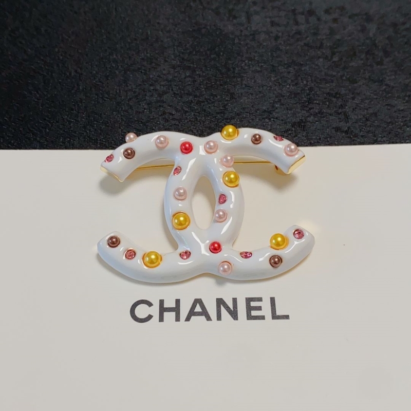 Ch**el brooches